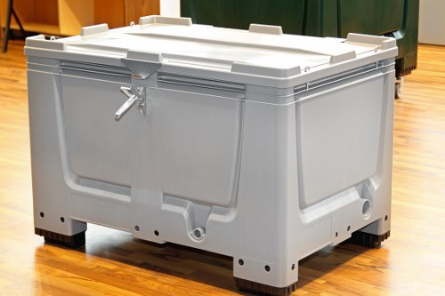 Operatives attending a toolbox talk about manual handling and PPE